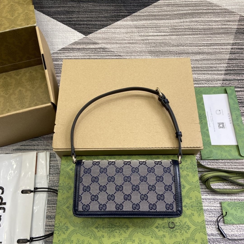 G*u*i top handle bags